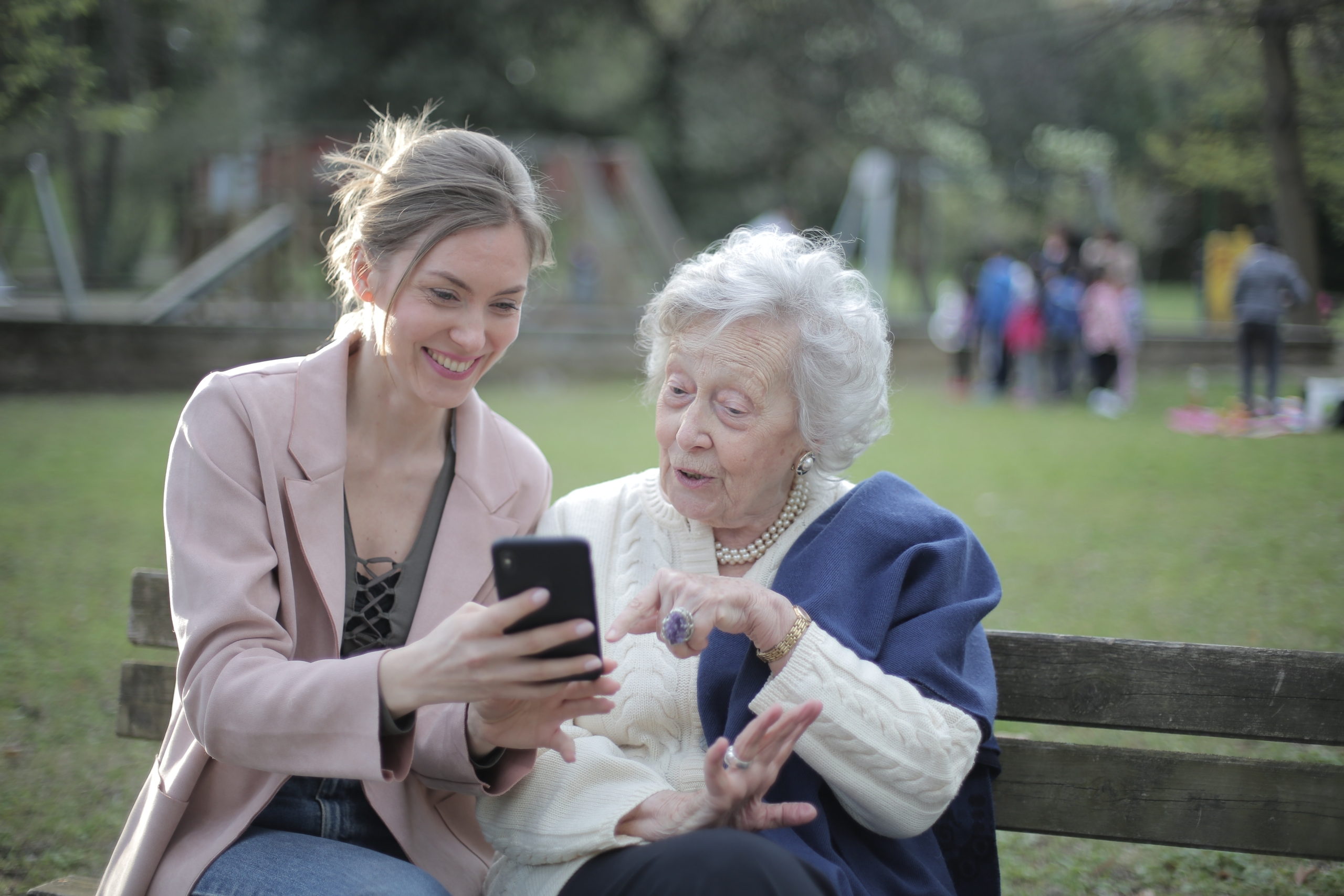 a daughter showing her winnings to her mother