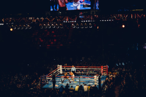 Two boxers fighting in a ring