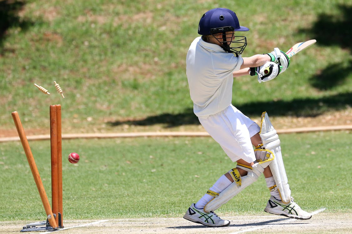 Acricket batsman getting bowled out
