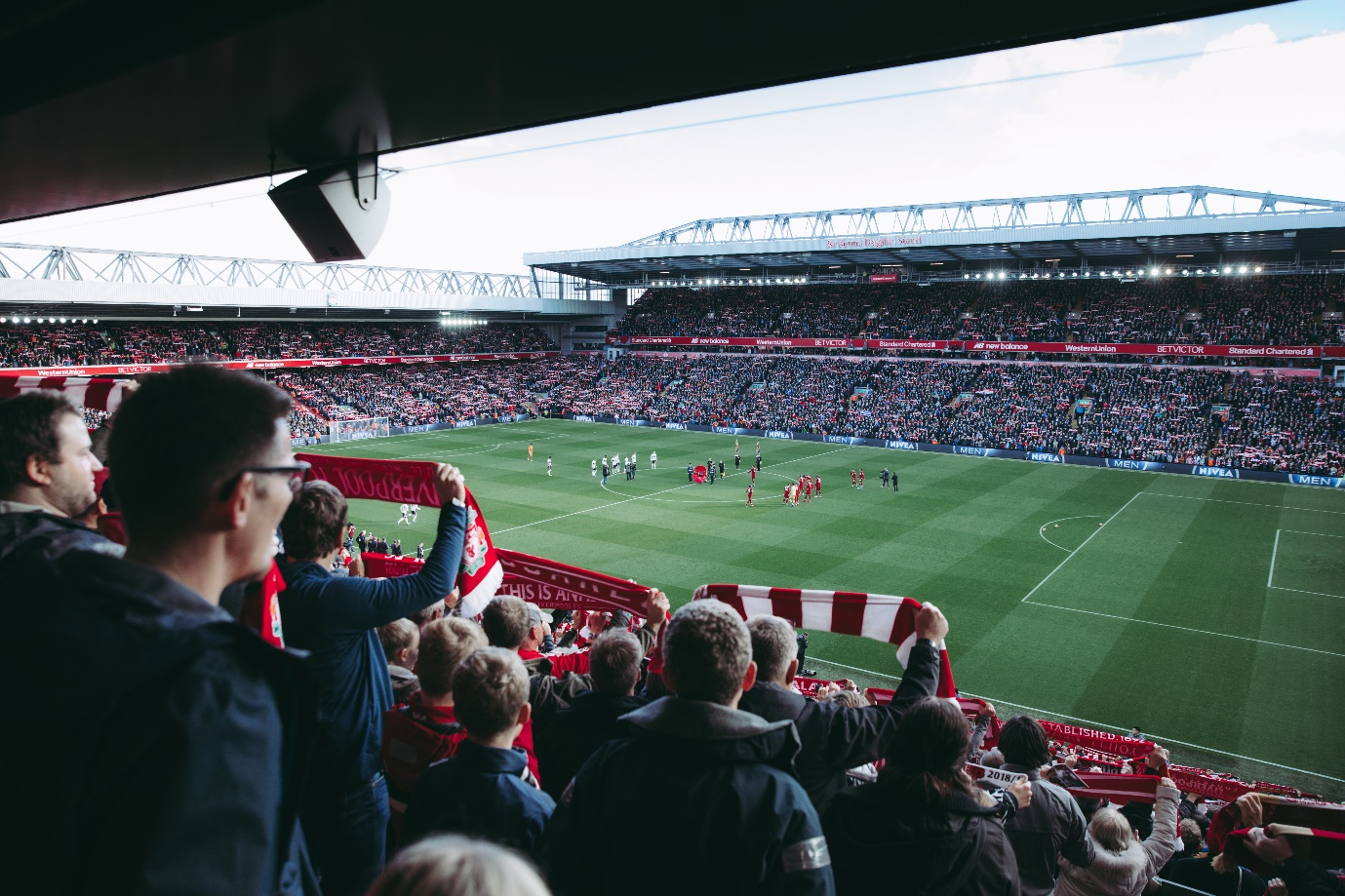 people watching a soccer game