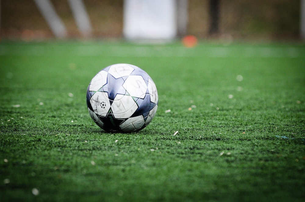 A soccer ball on a grassy surface