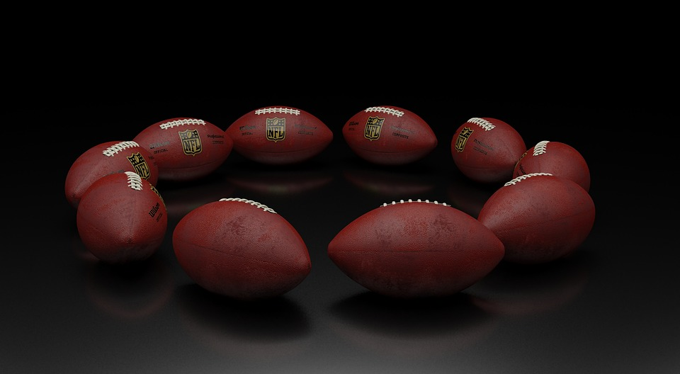NFL balls arranged in a circle
