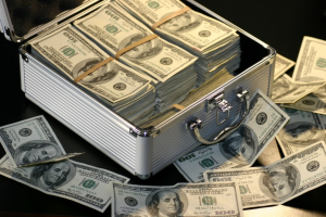 A case full of dollar bills