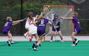 female lacrosse teams in action